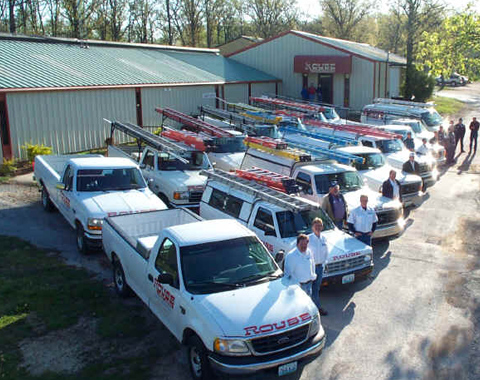 Rouse Heating & Air Conditioning parking lot full of trucks