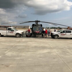 Rouse trucks and Black Hawk helicopter